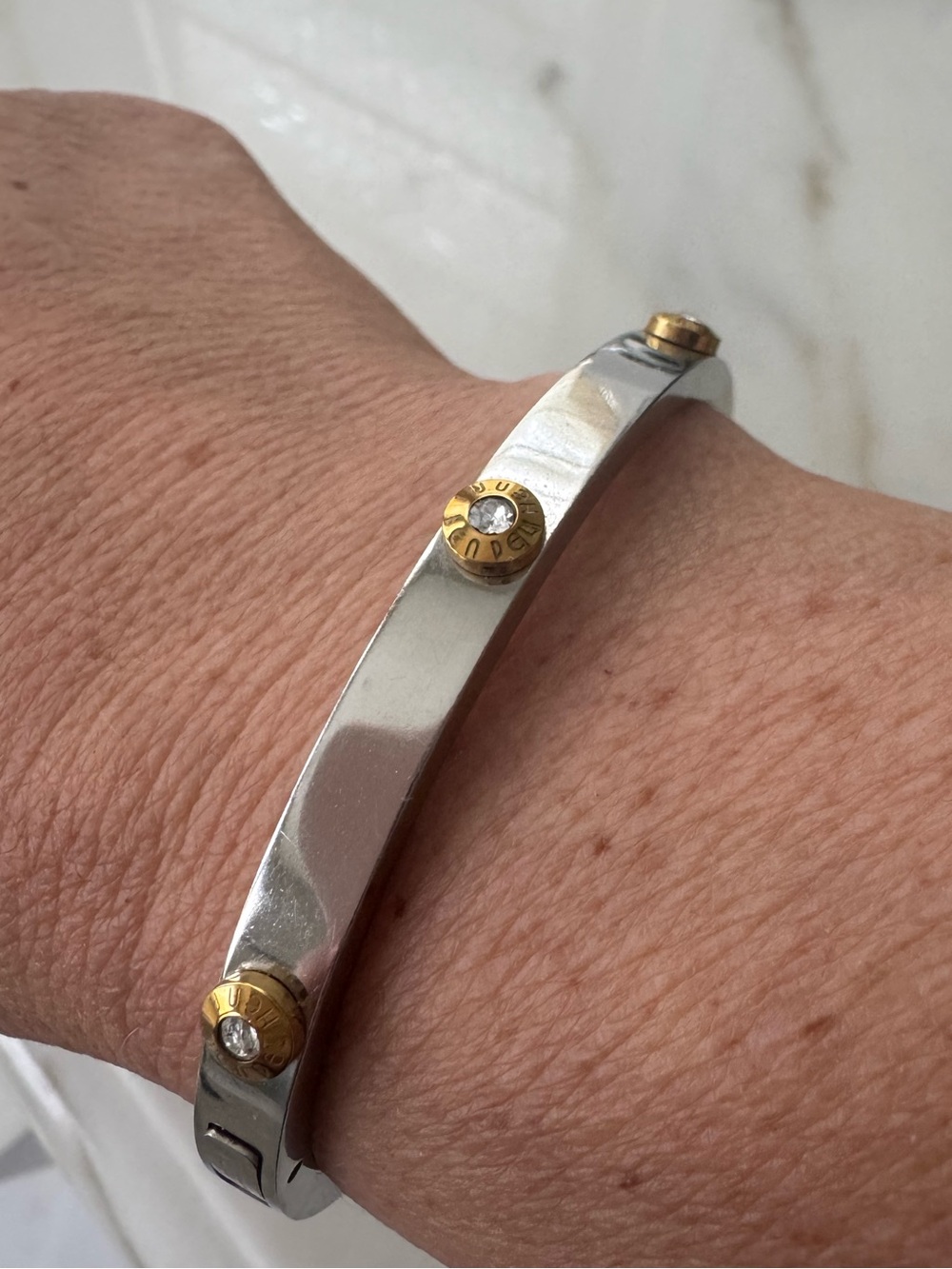Henri Bendel Hinged Silver Tone (with gold screw accents) Bangle Bracelet